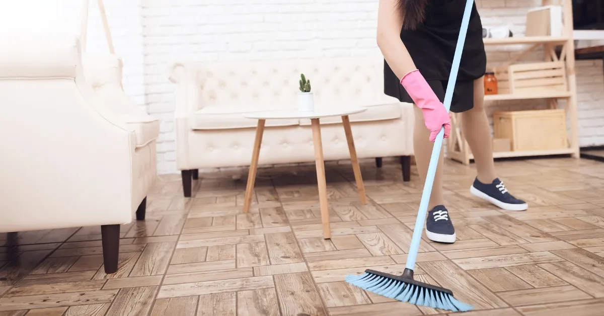 Woman Sweeping the floor