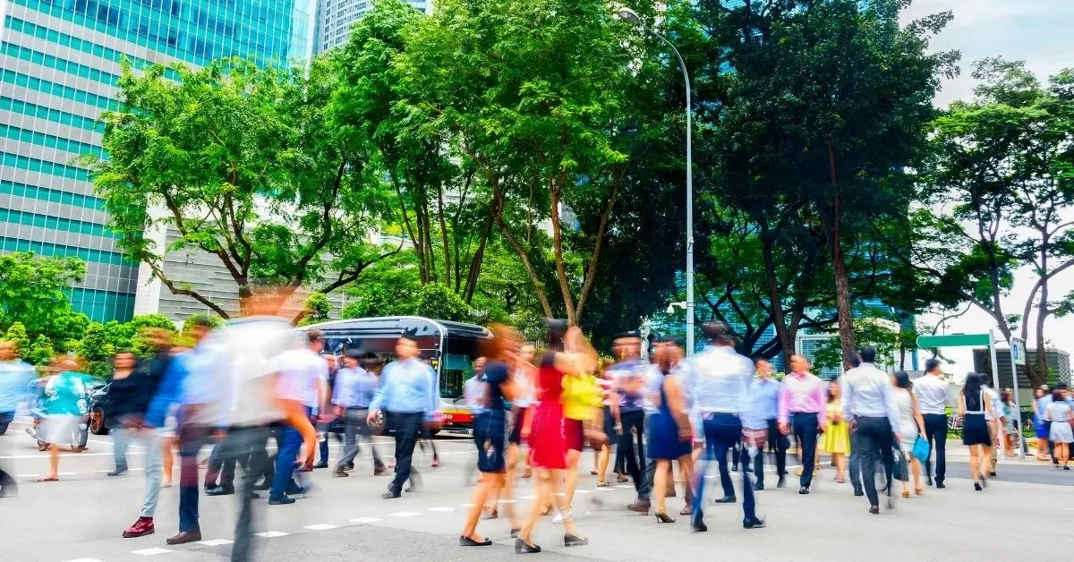 Crowd of people crossing a street