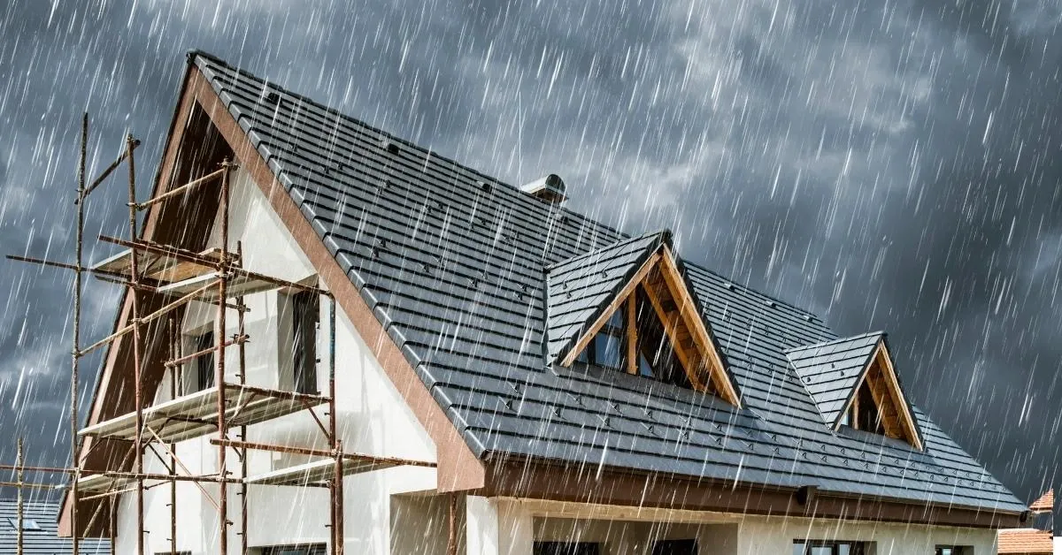 House being renovated with rain in the background
